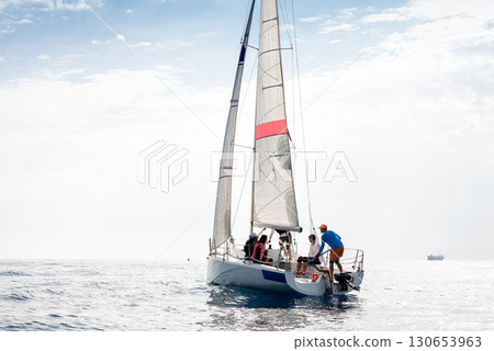 Serene sailing on a sunlit sea Serene sailing on a sunlit sea 130653963