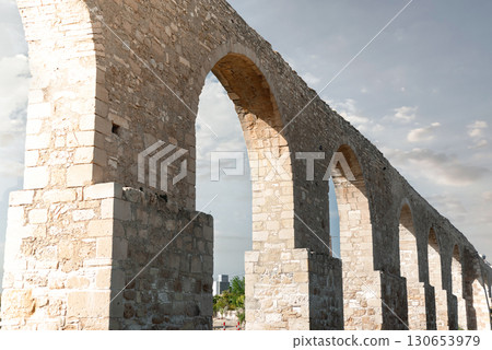 Kamares aqueduct standing tall under cloudy sky in Larnaca, Cyprus Kamares aqueduct standing tall under cloudy sky in Larnaca, Cyprus 130653979