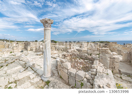 Kourion archaeological site ruins with columns under blue sky with clouds. Limassol District, Cyprus Kourion archaeological site ruins with columns under blue sky with clouds. Limassol District, Cyprus 130653996
