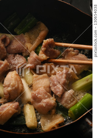 Grilled chicken thighs with green onions Grilled chicken thighs with green onions 130654038