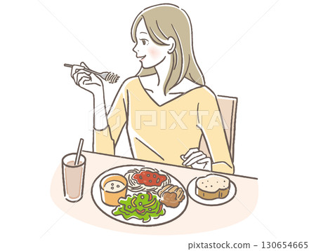 一位女士正在吃西餐 130654665