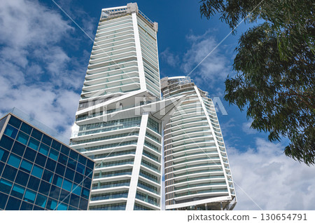 Modern skyscrapers reaching for the clouds in the city. Limassol, Cyprus 130654791