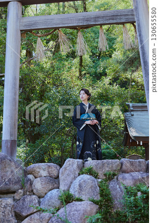 A woman in a kimono posing in front of a torii gate | Japanese garden, Japanese style, tourism image A woman in a kimono posing in front of a torii gate | Japanese garden, Japanese style, tourism image 130655580