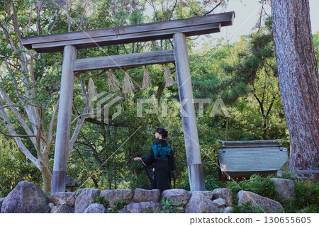 A woman in a kimono posing in front of a torii gate | Japanese garden, Japanese style, tourism image A woman in a kimono posing in front of a torii gate | Japanese garden, Japanese style, tourism image 130655605