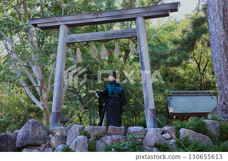 A woman in a kimono posing in front of a torii gate | Japanese garden, Japanese style, tourism image A woman in a kimono posing in front of a torii gate | Japanese garden, Japanese style, tourism image 130655613