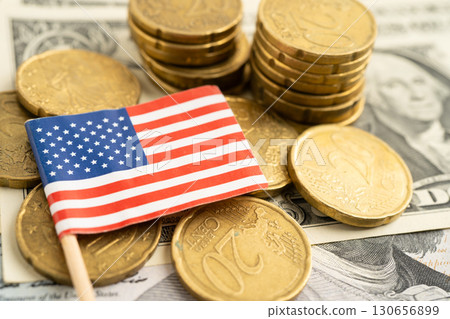 US America flag on coin and banknote money, finance trading investment business currency. US America flag on coin and banknote money, finance trading investment business currency. 130656899