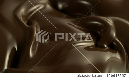 Macro shot of premium dark chocolate pouring. Freeze motion, splashing melted chocolate background. 130657567