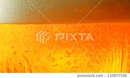Macro Shot of Pouring Beer Drink , abstract bacground 130657596