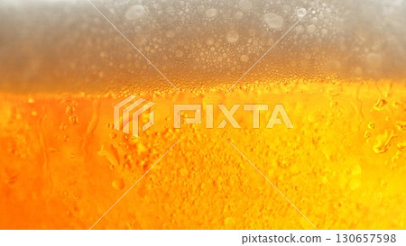 Macro Shot of Pouring Beer Drink , abstract bacground 130657598