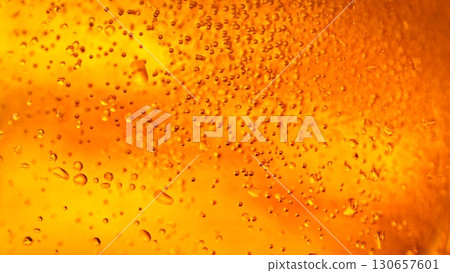 Macro Shot of Pouring Beer Drink , abstract bacground 130657601