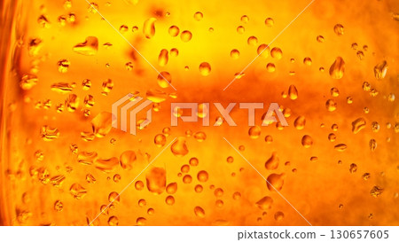 Macro Shot of Pouring Beer Drink , abstract bacground 130657605