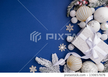 Silver New Year Decor with White Ornaments and Gift 130657876