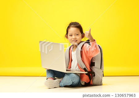 Enthusiastic Korean Child showing thumb up, Thrives in Online Learning. Adorable Japanese Kid Excels in Digital Classroom Enthusiastic Korean Child showing thumb up, Thrives in Online Learning. Adorable Japanese Kid Excels in Digital Classroom 130657963