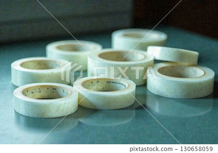 Adhesive tape for packaging, workplace desk in office. AI Generative 130658059