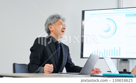 Group of business people meeting in a conference room Group of business people meeting in a conference room 130658625