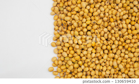Soybeans Aligned on Right Side over White Background. Raw Legumes and Plant Protein Soybeans Aligned on Right Side over White Background. Raw Legumes and Plant Protein 130659410
