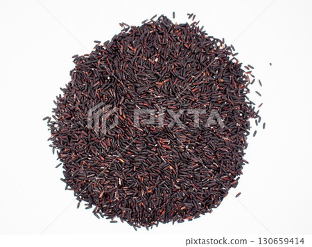Heap of riceberry rice grains on white background. Perfect for use in organic food concepts 130659414