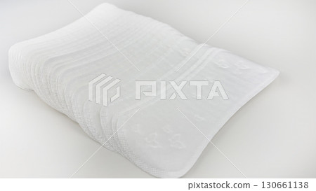 Womens sanitary pads on white background, top view. Feminine hygiene and menstruation product. Daily pad for period care, womens health, advertising, article or banner concept 130661138