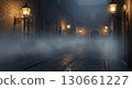 Foggy old street with lanterns glowing at night 130661227