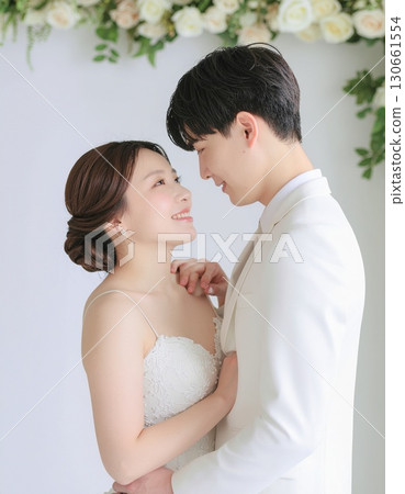 Two people gazing at each other in the soft light 130661554