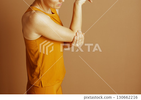 Woman Soothing Her Painful Elbow Woman Soothing Her Painful Elbow 130662216