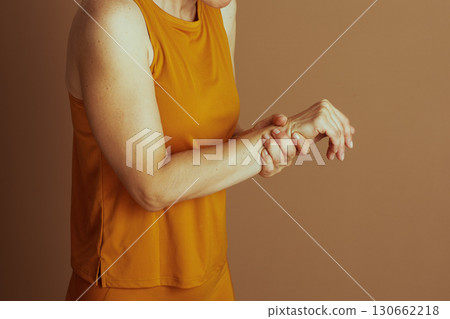 Woman Soothing Her Painful Wrist Woman Soothing Her Painful Wrist 130662218