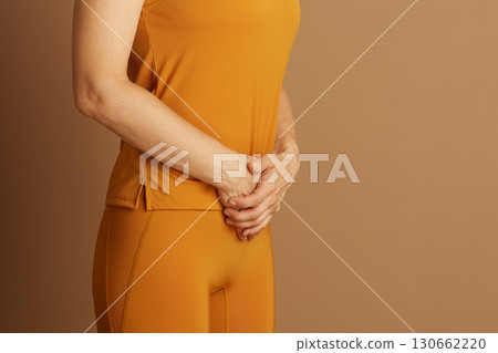 Woman Experiencing Abdominal Discomfort Woman Experiencing Abdominal Discomfort 130662220