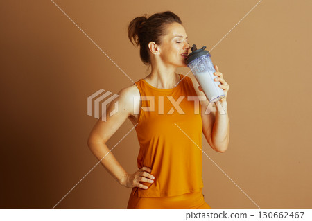 Content Woman Savoring a Healthy Protein Shake 130662467