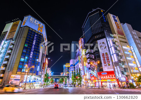 Tokyo cityscape, Japan. Akihabara is bustling with young people and foreign tourists even late at night = 7:48 p.m. Tokyo cityscape, Japan. Akihabara is bustling with young people and foreign tourists even late at night = 7:48 p.m. 130662820