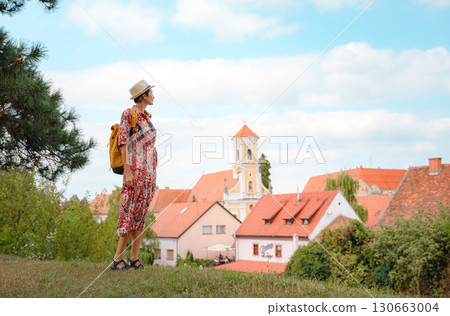 Woman Walking Through the Historic Center of Varazdin Woman Walking Through the Historic Center of Varazdin 130663004