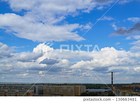 Panoramic cityscape with clouds and apartments 130663481