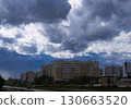 Storm clouds over residential apartment buildings 130663520