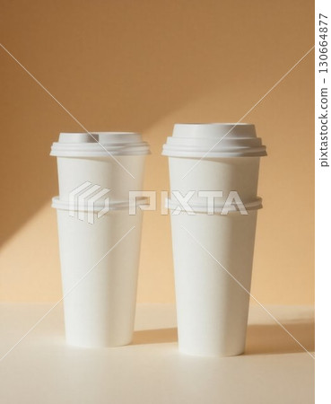 white disposable coffee cup on the wall white disposable coffee cup on the wall 130664877