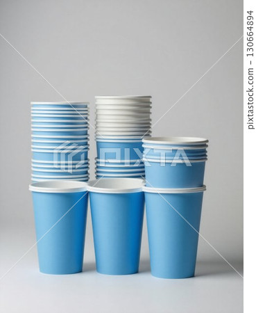 clean and clean white cups on a gray background 130664894