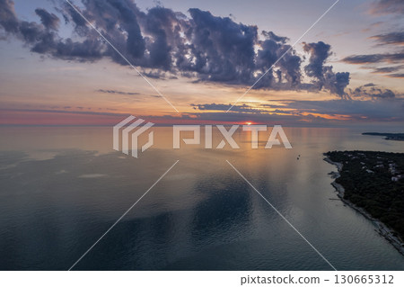 Sunset clouds over the Adriatic coast. Istria, Croatia. Sunset clouds over the Adriatic coast. Istria, Croatia. 130665312