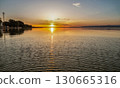 Spectacular sunset over lake Balaton with golden reflections, Hungary. 130665316