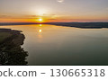 Spectacular sunset over lake Balaton with golden reflections, Hungary. 130665318