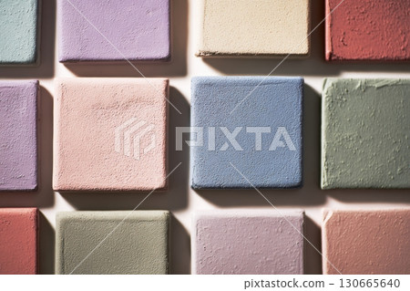 Close-up of stacked ceramic tiles in pastel colors 130665640