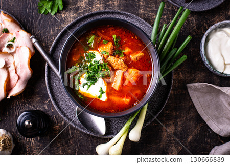 Traditional Ukrainian borsch with sour cream 130666889