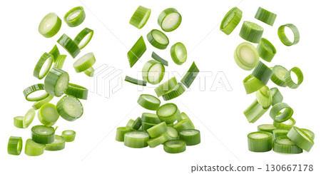Freshly chopped green onions or scallions scattered on transparent background, cooking ingredient ready to use 130667178