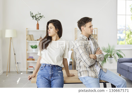 Young Family Couple Offended During Conflict At Home Young Family Couple Offended During Conflict At Home 130667571