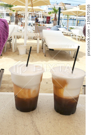 tasty, refreshing cocktail on the seashore tasty, refreshing cocktail on the seashore 130670186
