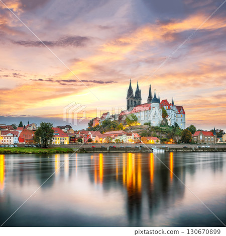 Amazing view on Albrechtsburg castle and cathedral on the River Elbe with dramatic sunset. Amazing view on Albrechtsburg castle and cathedral on the River Elbe with dramatic sunset. 130670899