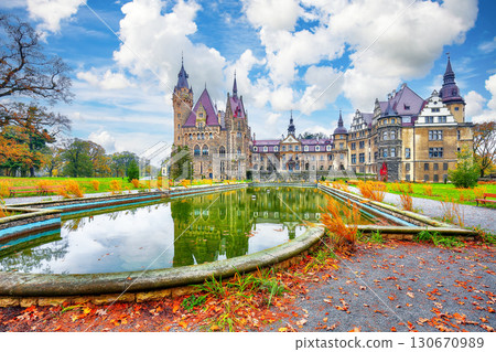 Amazing  autumn landscape with Moszna Castle. Popular tourist destination. 130670989