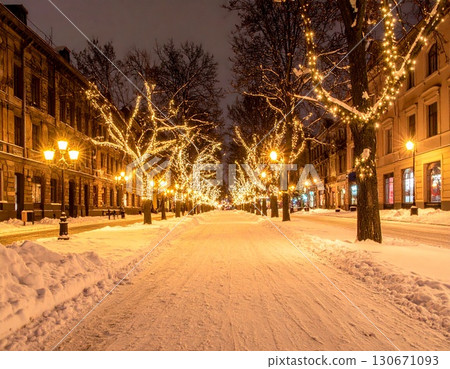 Illuminated tree-lined streets decorating the winter streets Illuminated tree-lined streets decorating the winter streets 130671093