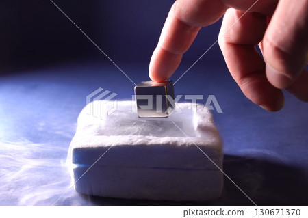 cube levitation on a magnetic cushion. Properties of frozen meta 130671370