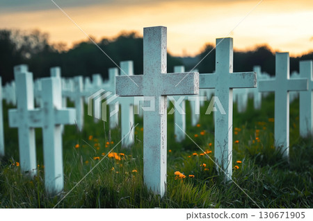 Military cemetery honoring soldiers in peaceful remembrance at dusk 130671905