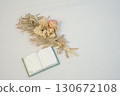 Dried flowers and book ornament 130672108