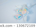 Aurora colored roses and white background 130672109