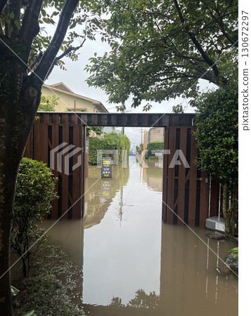 Road flooded by heavy rain Road flooded by heavy rain 130672297